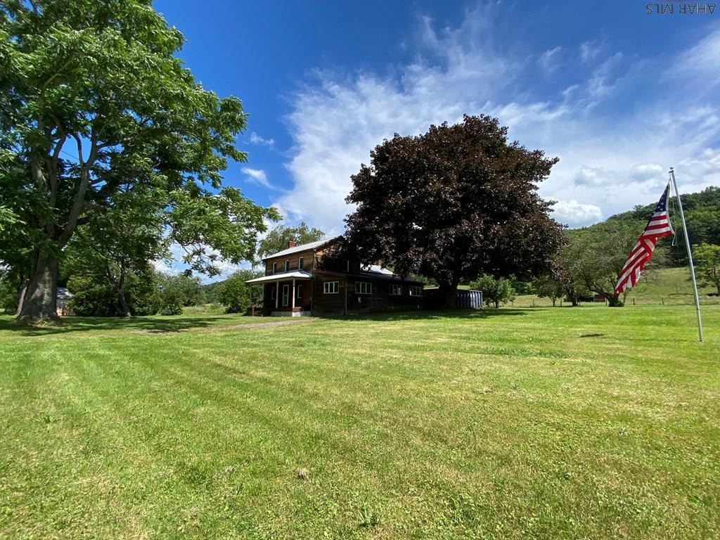 1648 Allegheny Road Manns Choice, PA 15550 - Photo 2 of 53 a view of a field of grass and trees