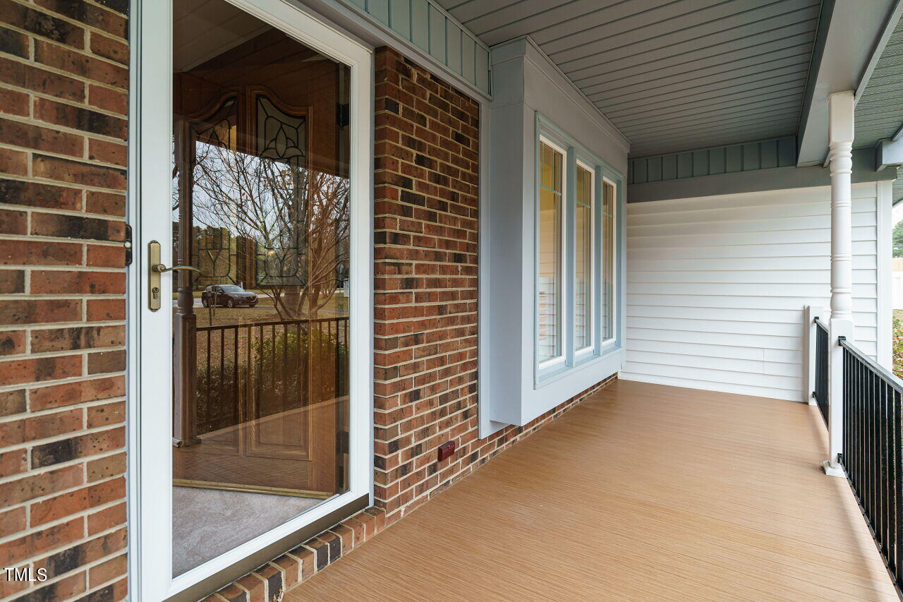 5917 Countryview Lane Raleigh, NC 27606 - Photo 2 of 43 Inviting covered front porch welcomes you home.