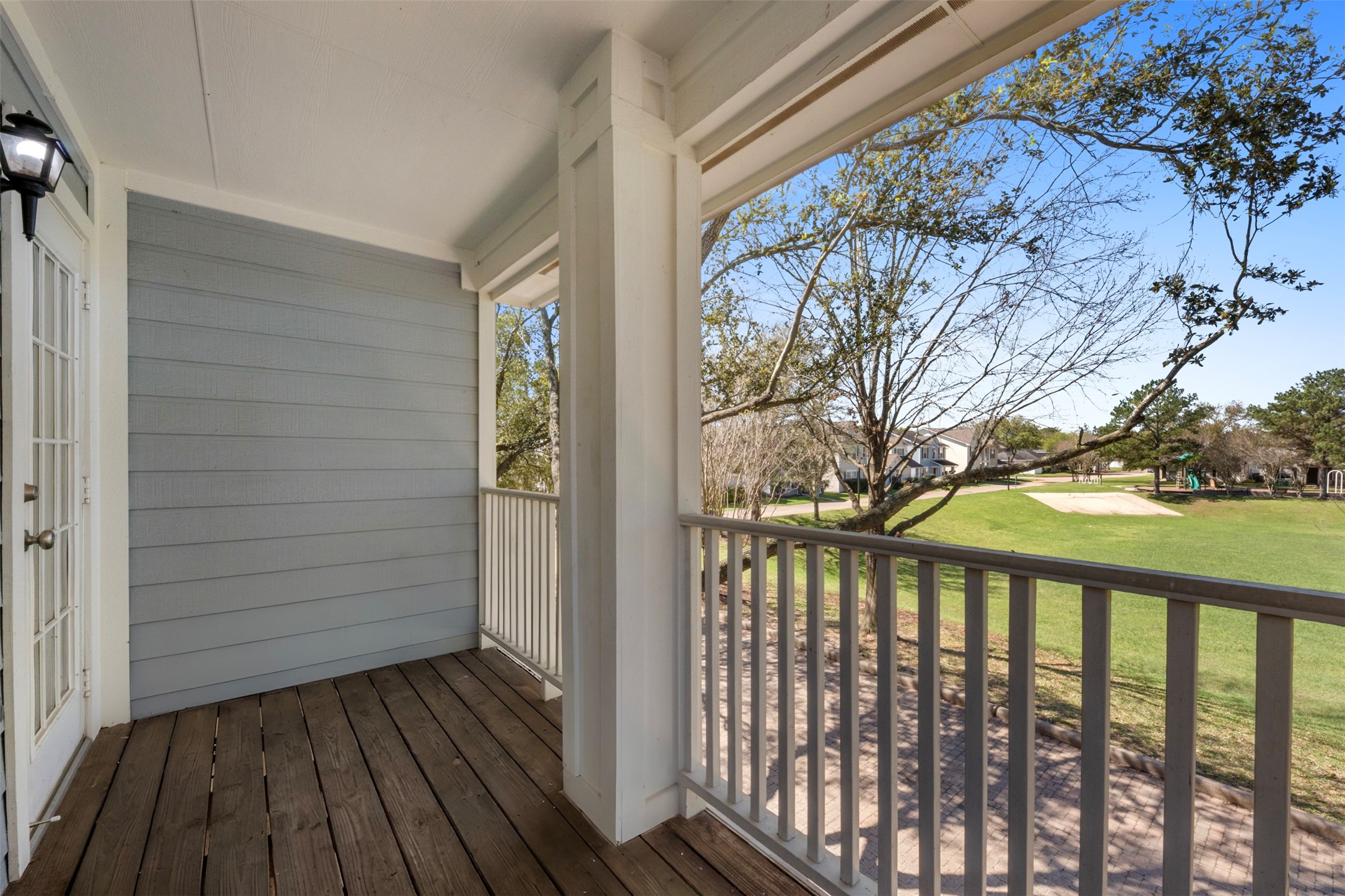 9606 Farrell Drive Houston, TX 77070 - Photo 26 of 37 a view of a balcony with wooden floor