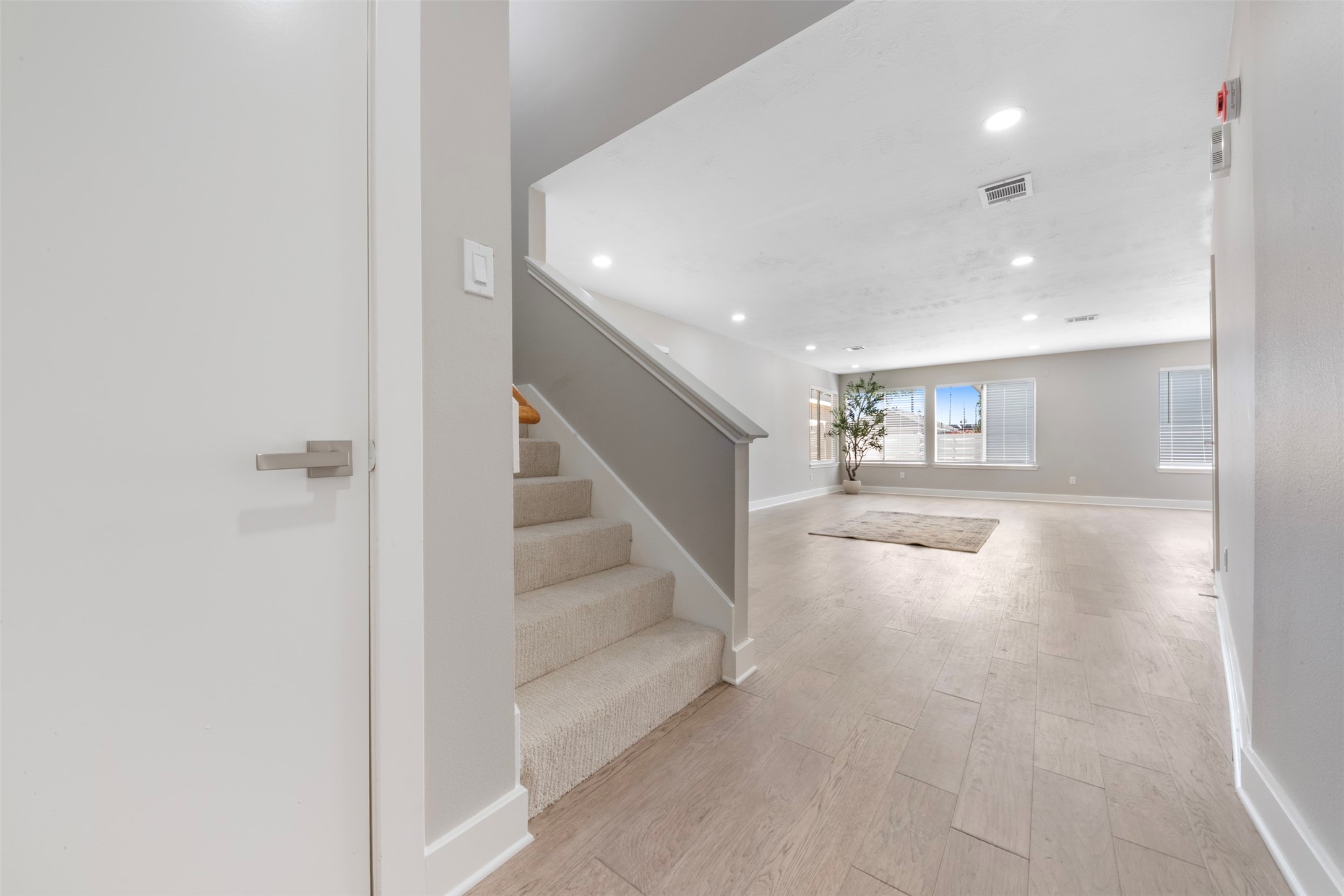 9606 Farrell Drive Houston, TX 77070 - Photo 3 of 37 a view of entryway and hall with wooden floor