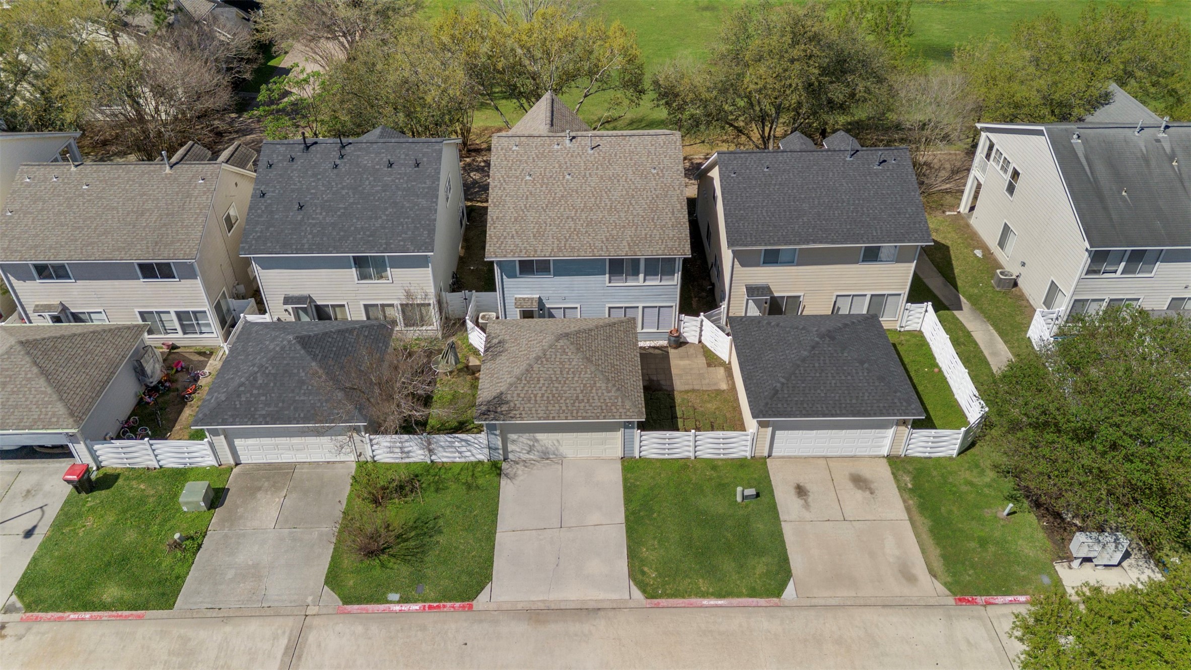 9606 Farrell Drive Houston, TX 77070 - Photo 33 of 37 an aerial view of residential houses with outdoor space and parking