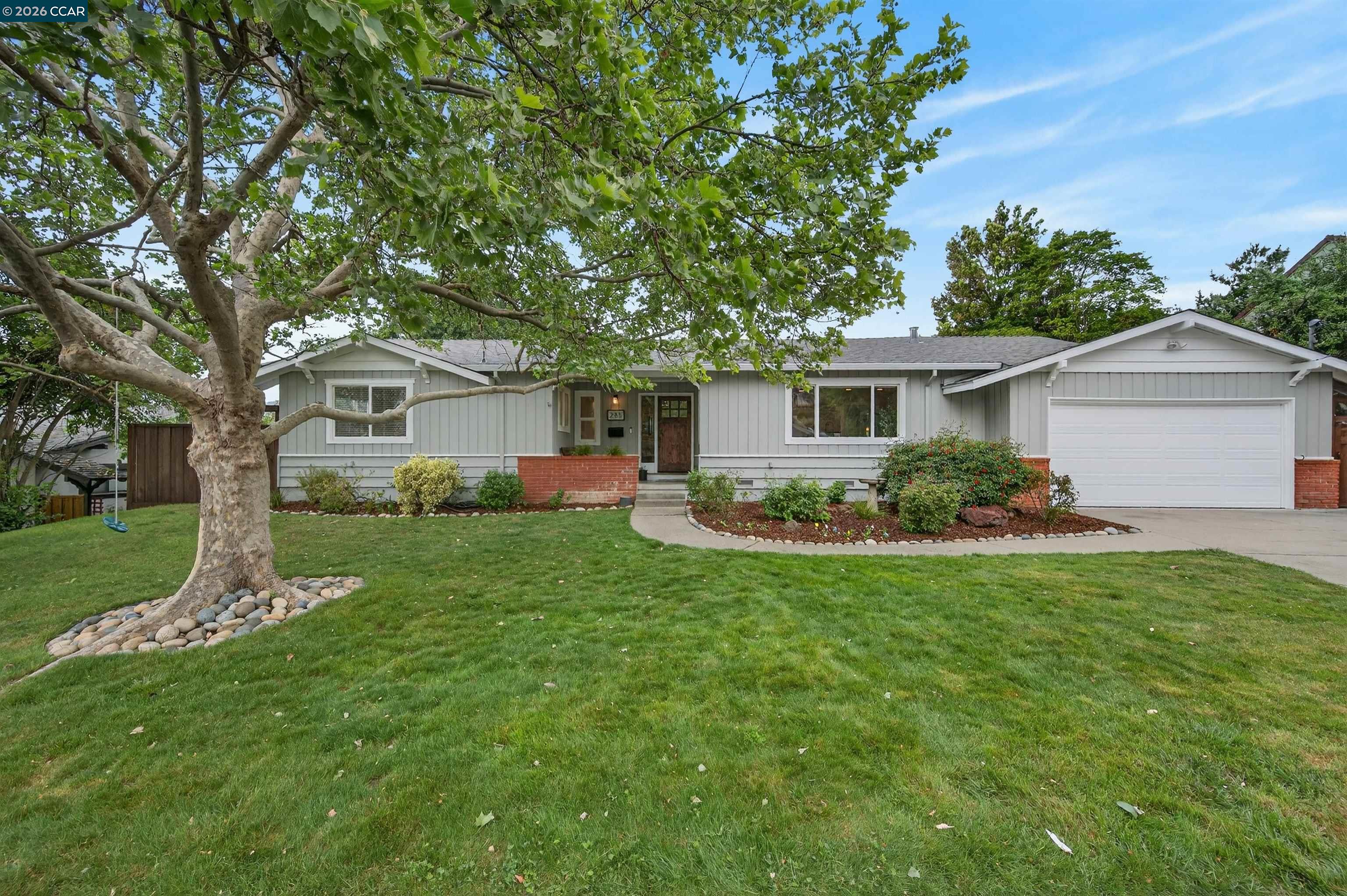 285 Apollo Way Pleasant Hill, CA 94523 - Photo 1 of 1 a front view of a house with a garden