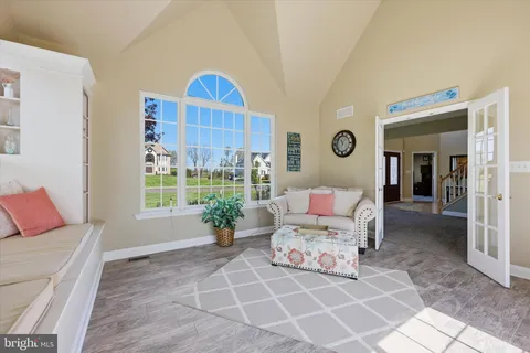a living room with furniture and window