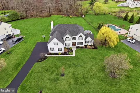 a aerial view of a house with garden
