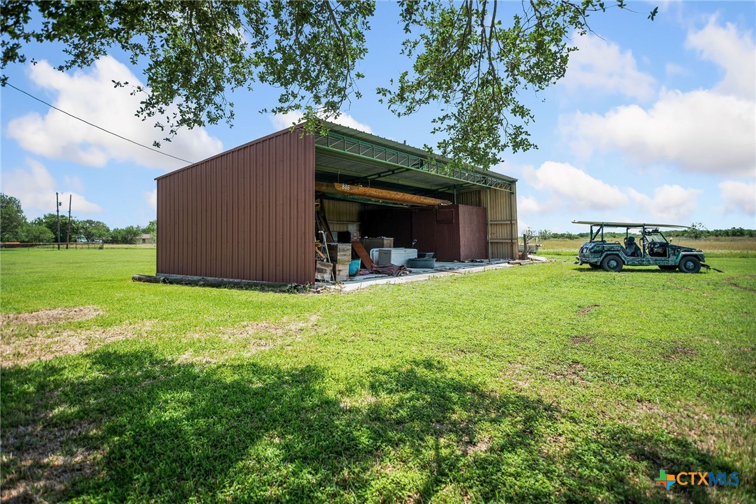 181 Pecan Street Port Lavaca, TX 77979 - Photo 26 of 34 a view of a house with backyard and garden