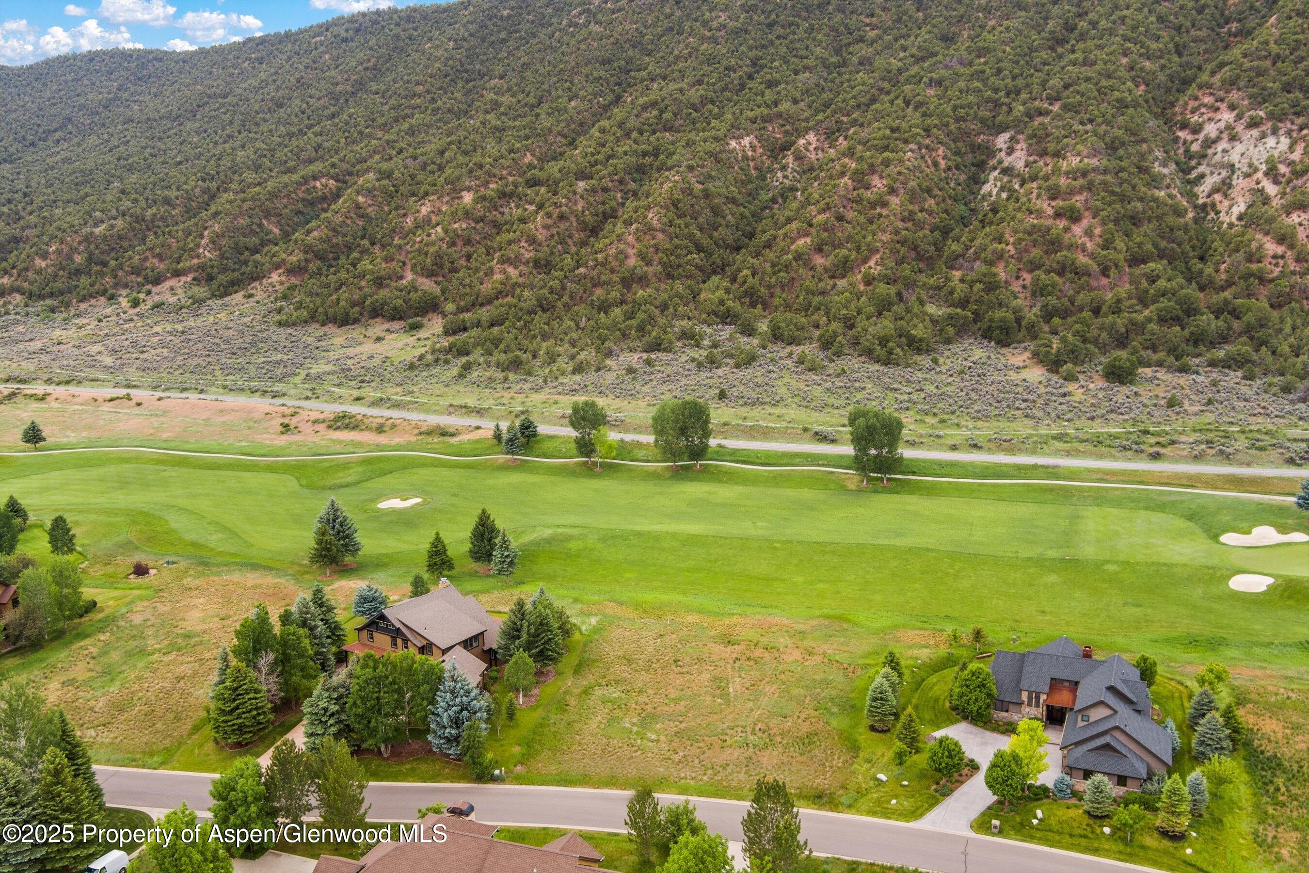 265 Saddleback Road Carbondale, CO 81623 - Photo 4 of 20 a view of a lake with a big yard