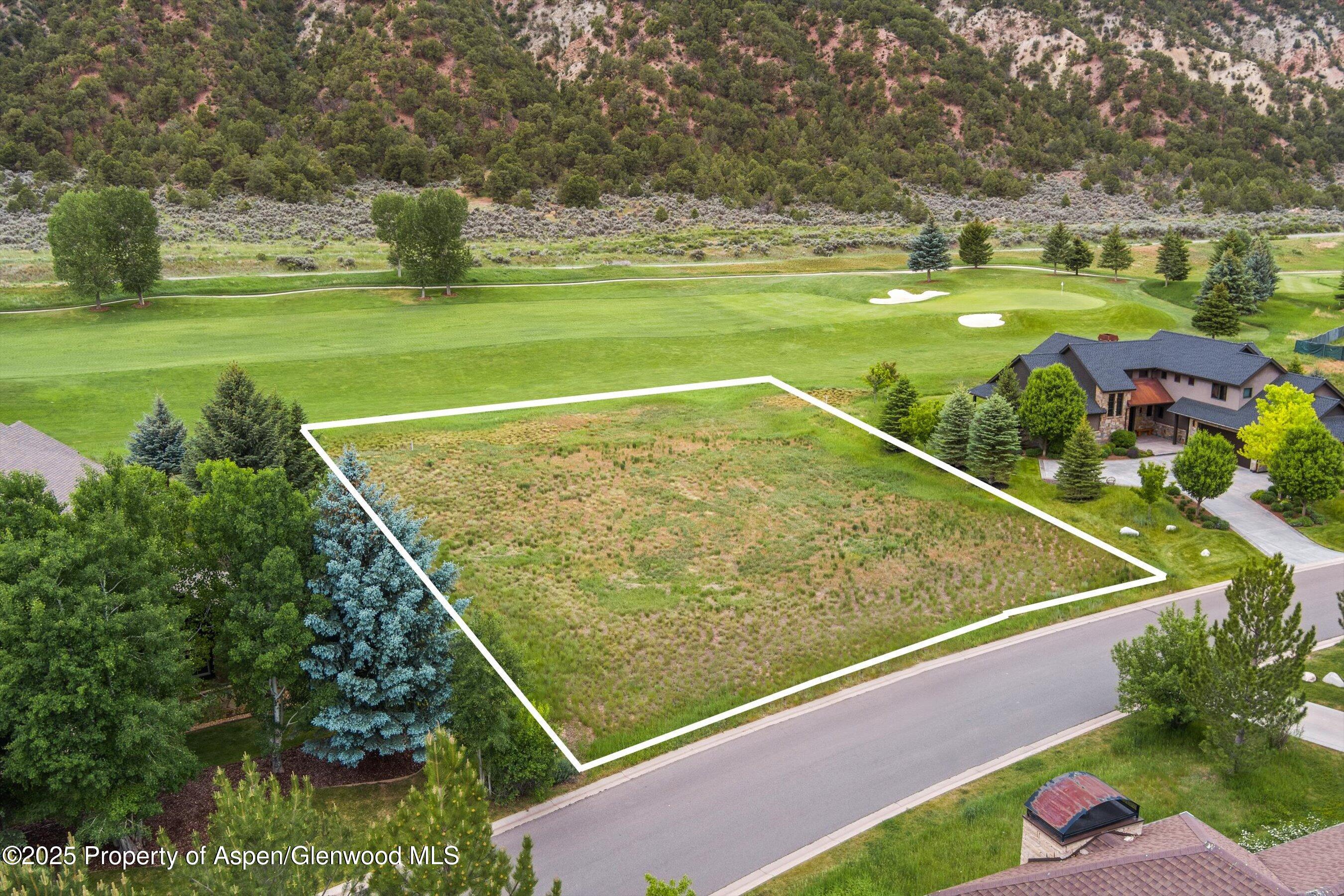 265 Saddleback Road Carbondale, CO 81623 - Photo 9 of 20 a view of a tennis ground with large trees