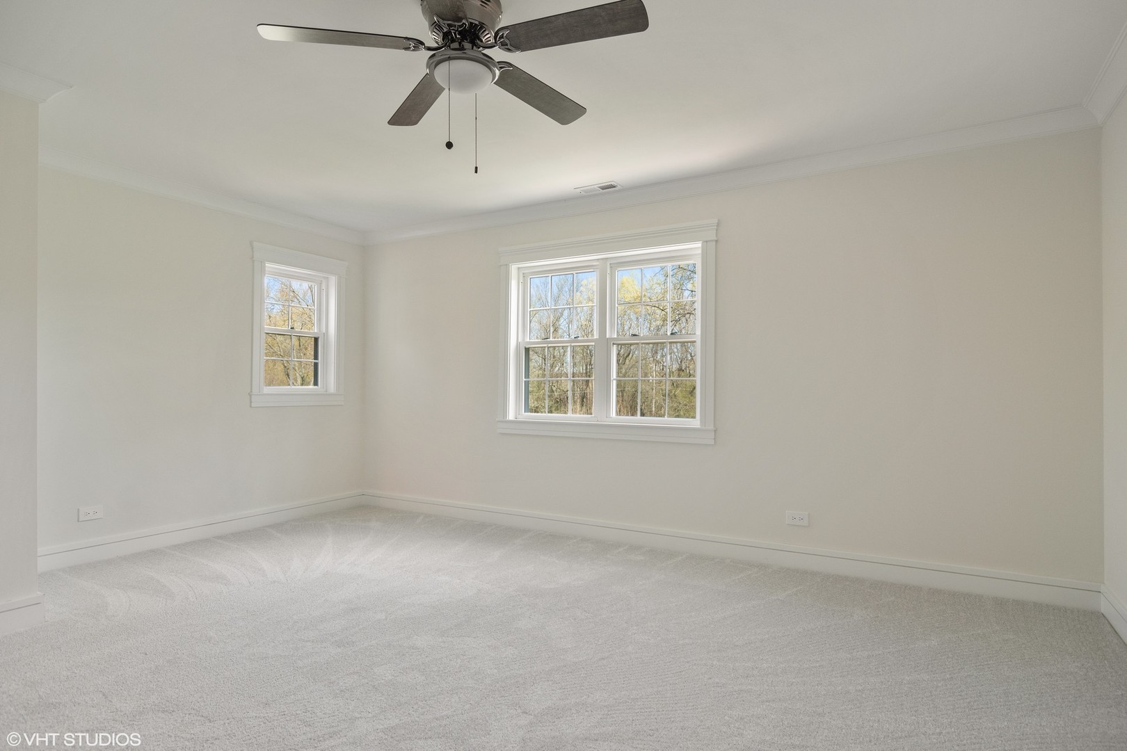 1652 Banbury Road Inverness, IL 60067 - Photo 17 of 28 an empty room with a window and a fan