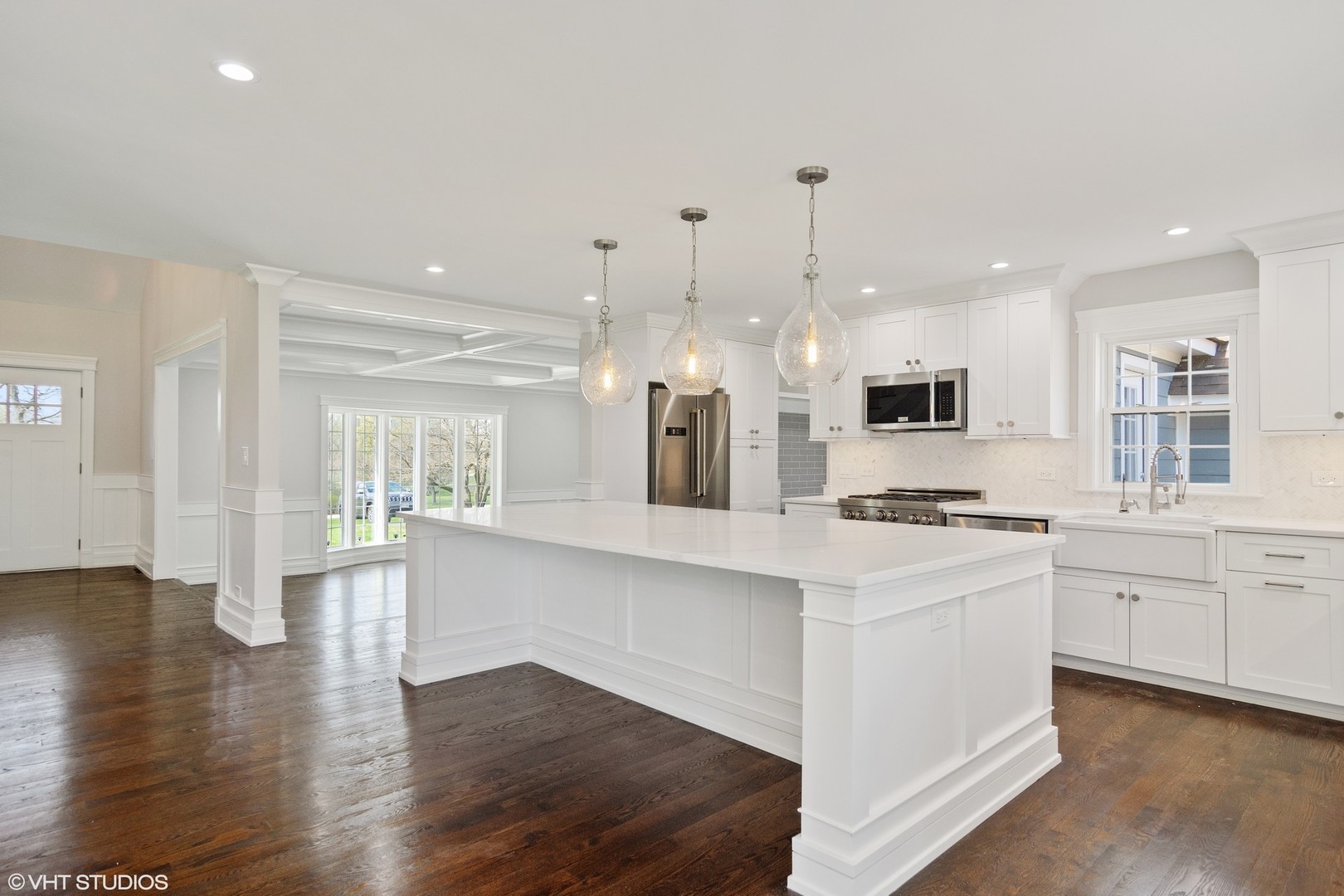 1652 Banbury Road Inverness, IL 60067 - Photo 9 of 28 a large white kitchen with lots of counter space a sink appliances and cabinets