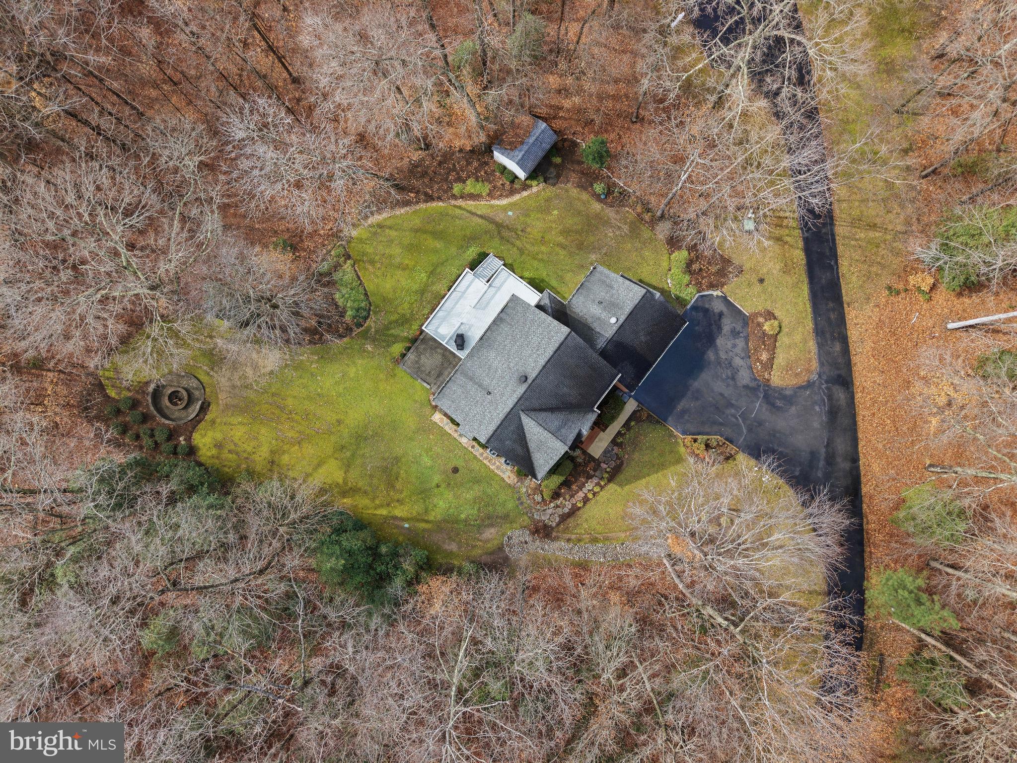 2623 Sequoia Way Prince Frederick, MD 20678 - Photo 15 of 57 an aerial view of a house with a yard and large tree