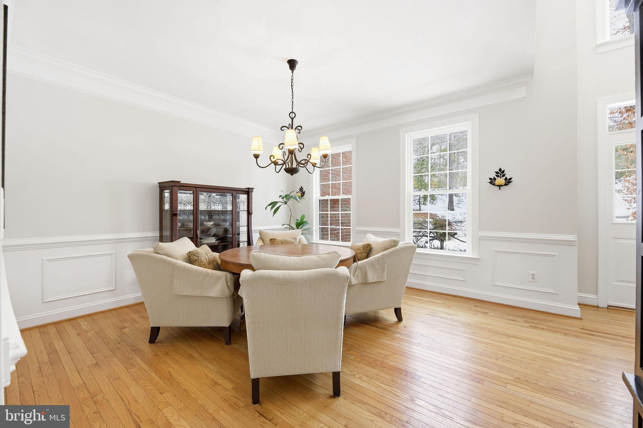 2623 Sequoia Way Prince Frederick, MD 20678 - Photo 22 of 57 a living room with furniture and a wooden floor