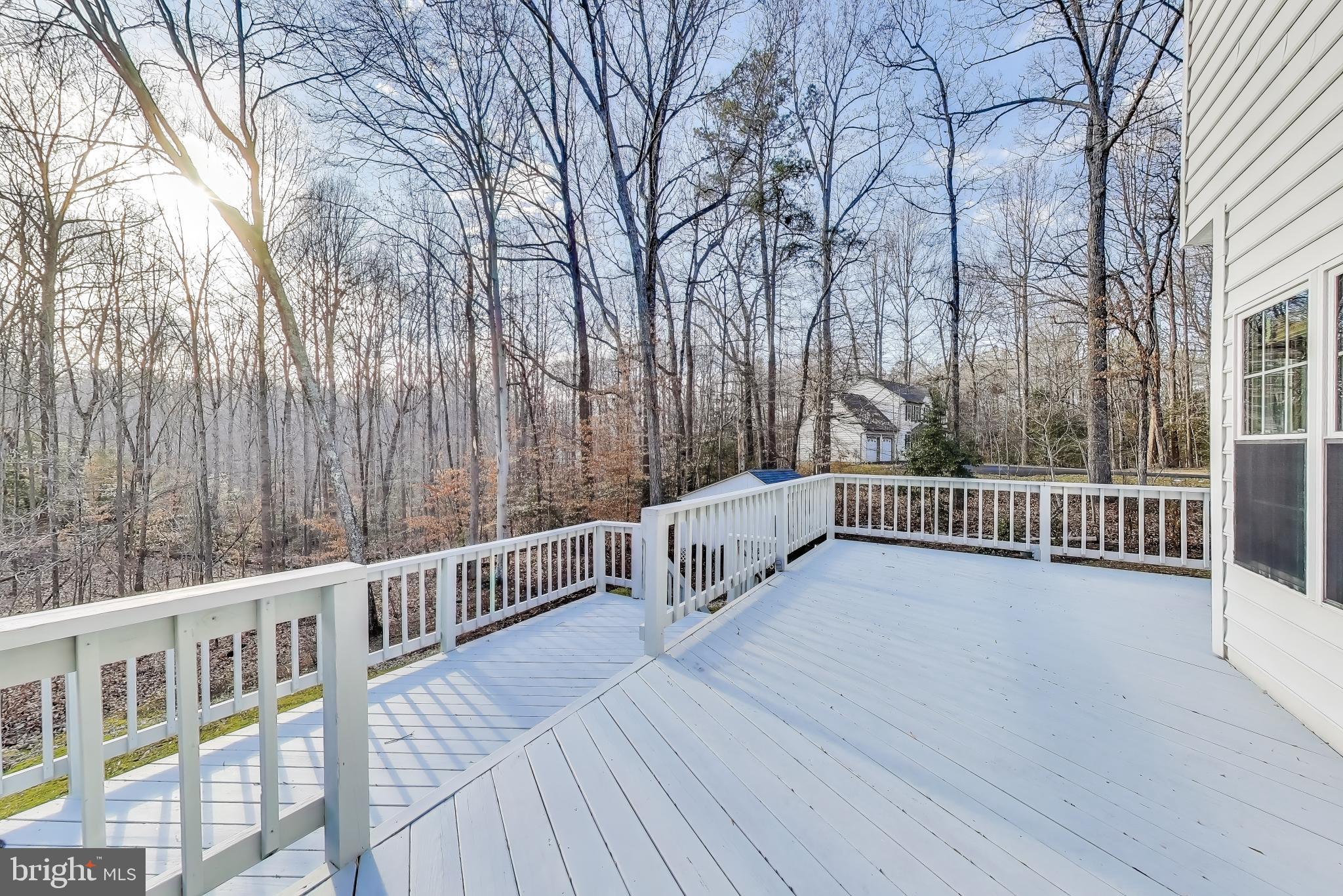 2623 Sequoia Way Prince Frederick, MD 20678 - Photo 41 of 57 a view of balcony with wooden floor and fence