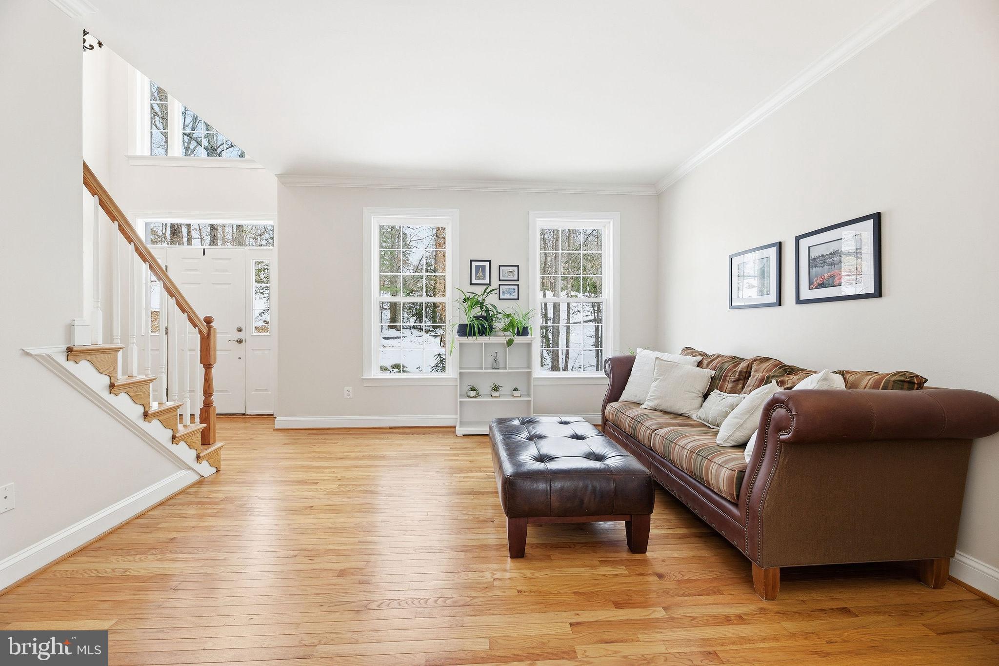 2623 Sequoia Way Prince Frederick, MD 20678 - Photo 5 of 57 a living room with furniture and a wooden floor