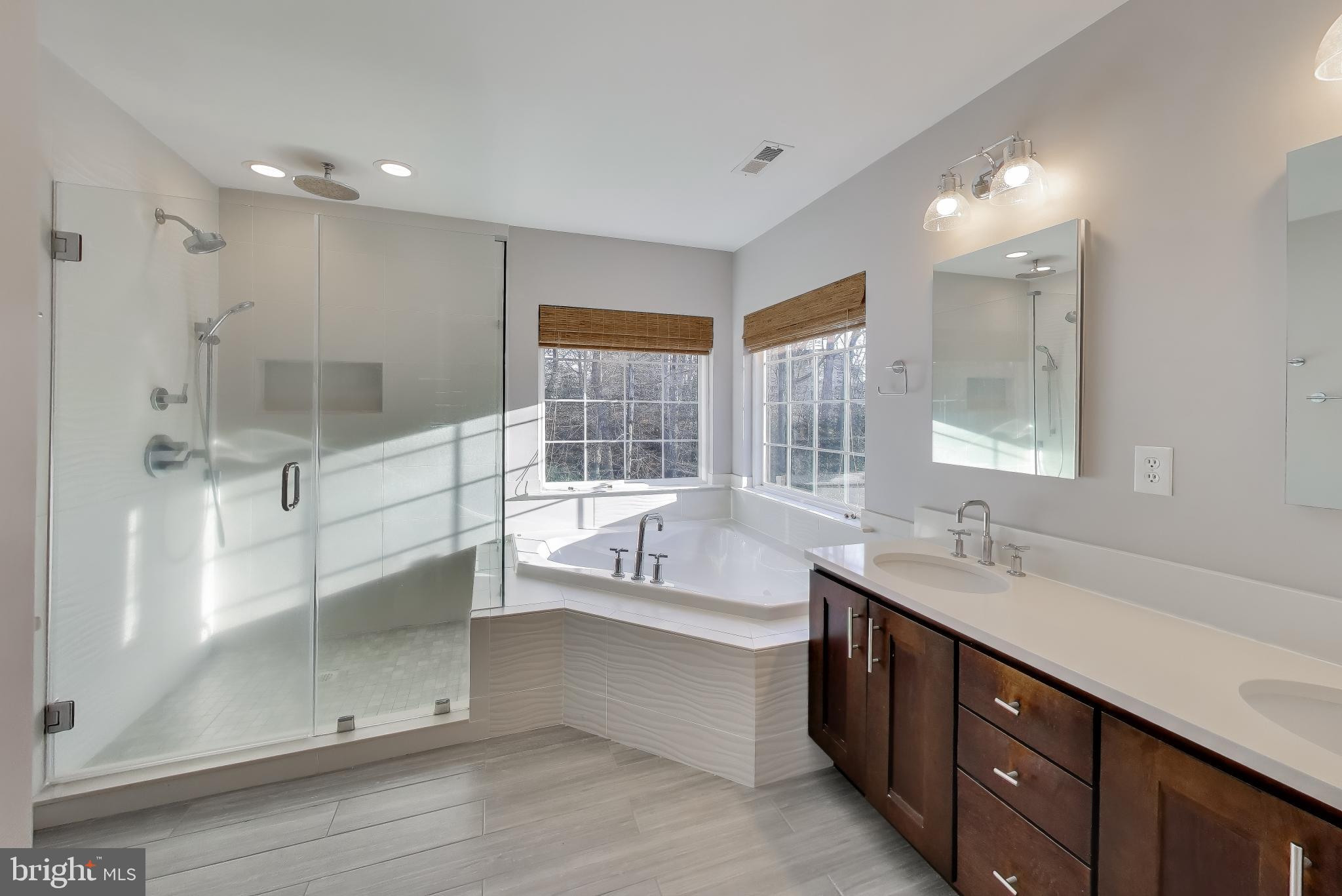 2623 Sequoia Way Prince Frederick, MD 20678 - Photo 7 of 57 a bathroom with a double vanity sink mirror and shower