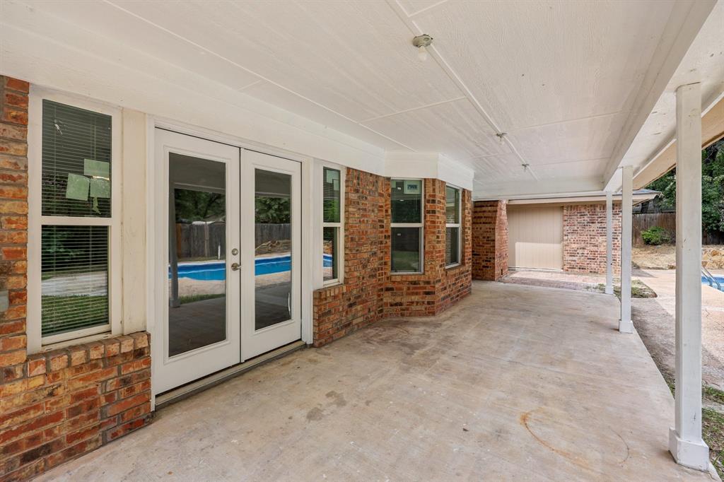 1033 Oak Ridge Drive Azle, TX 76020 - Photo 24 of 30 a view of the porch with seating space