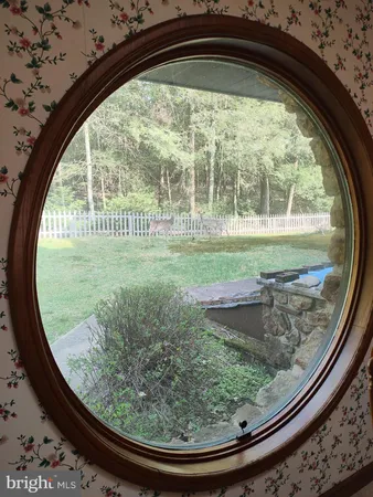 a view of a living room with swimming pool