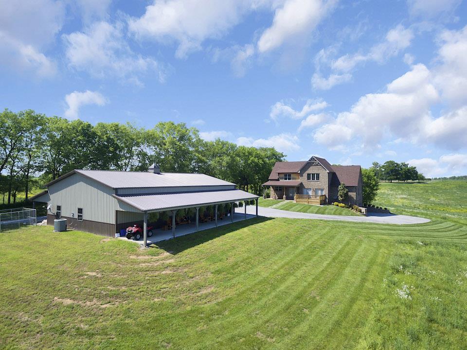 3869 Felts Road Cedar Hill, TN 37032 - Photo 8 of 30 a aerial view of a house with swimming pool and a big yard