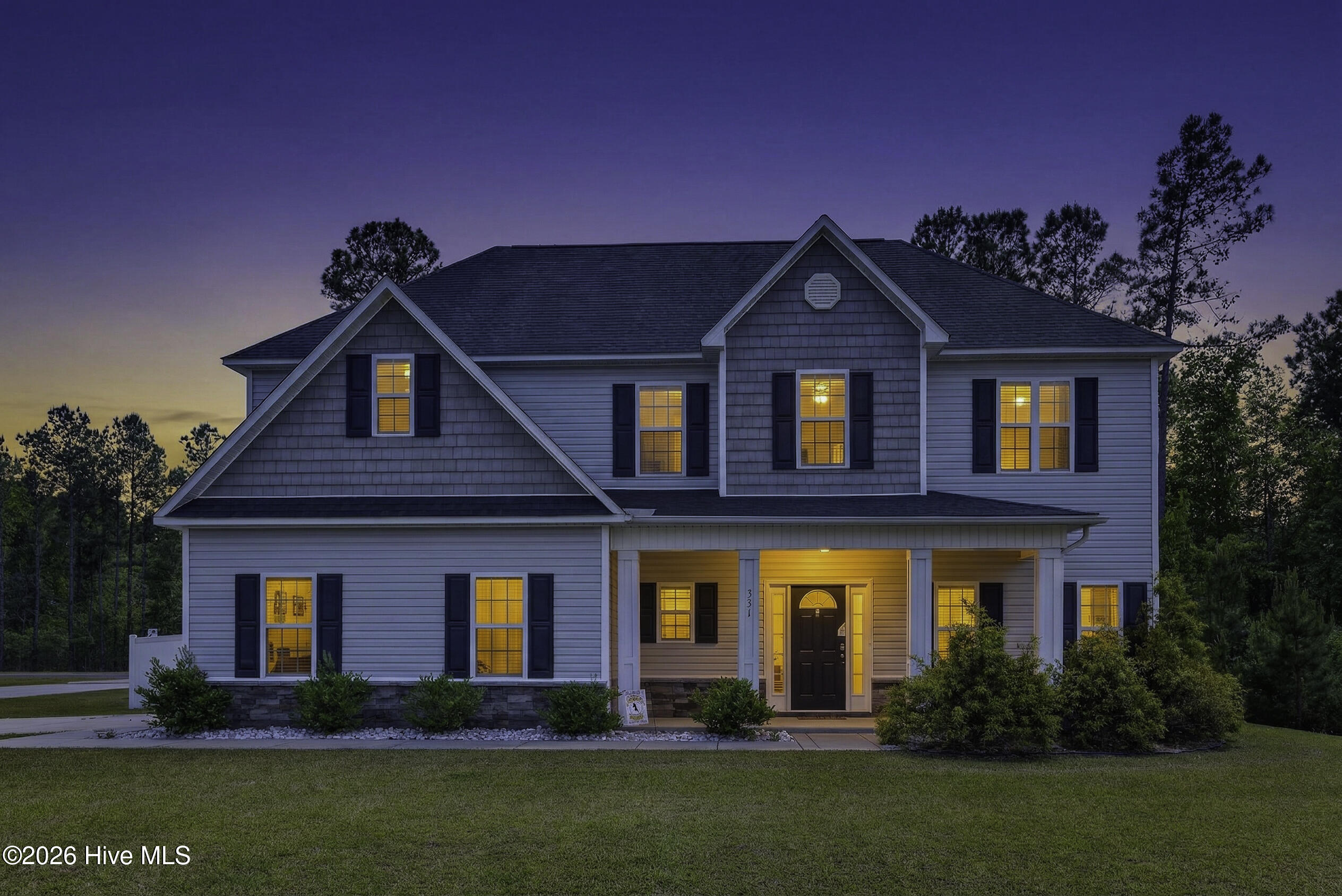 331 West Huckleberry Way Rocky Point, NC 28457 - Photo 1 of 24 331WHuckleberryWayReshoots-2_Dusk (1)