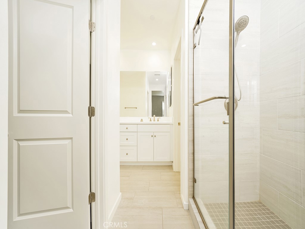 120 Messenger Irvine, CA 92618 - Photo 22 of 26 a bathroom with a shower and a sink