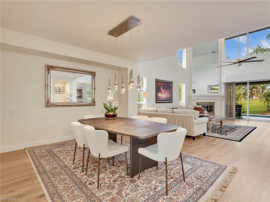 5242 Kensington High Street Naples, FL 34105 - Photo 15 of 45 The Dining Room with Gorgeous Pendant Chandelier!