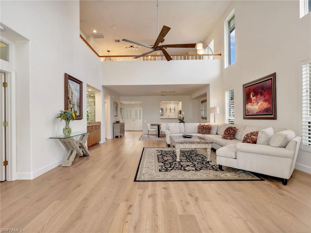 5242 Kensington High Street Naples, FL 34105 - Photo 20 of 45 Soaring ceilings with loft on the second floor