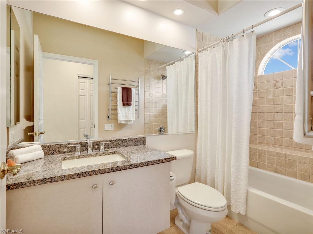 5242 Kensington High Street Naples, FL 34105 - Photo 33 of 45 2nd floor Guest Bathroom with shower/tub combo accessible to 2 guest bathrooms and living area