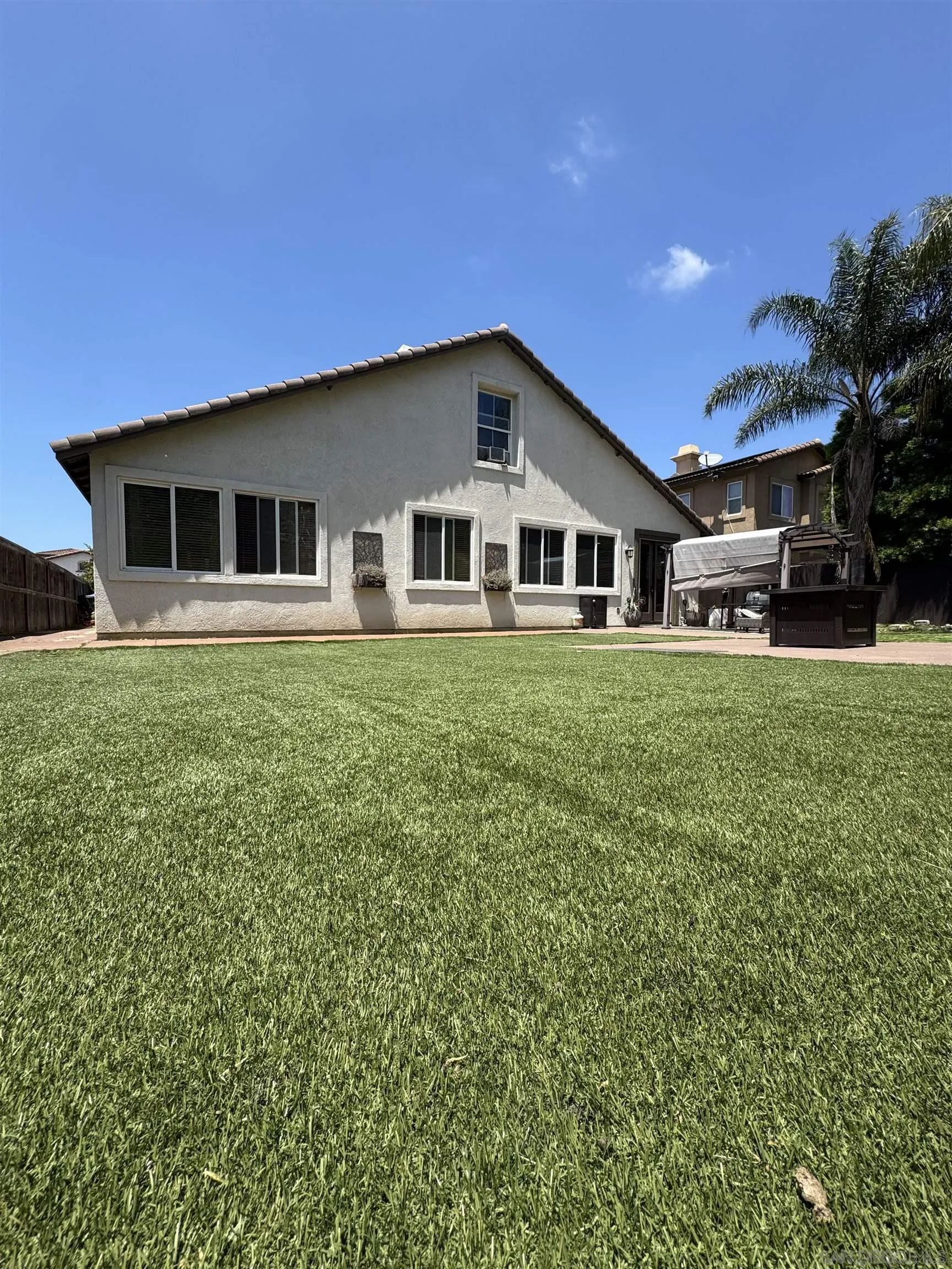 1120 Parkview Drive Oceanside, CA 92057 - Photo 4 of 8 a house that has a big yard with large trees