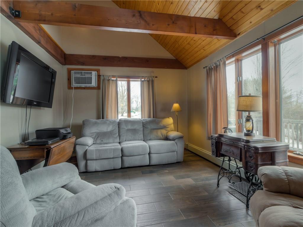182 Church Road New Gloucester, ME 04260 - Photo 8 of 32 Living room with vaulted ceilings