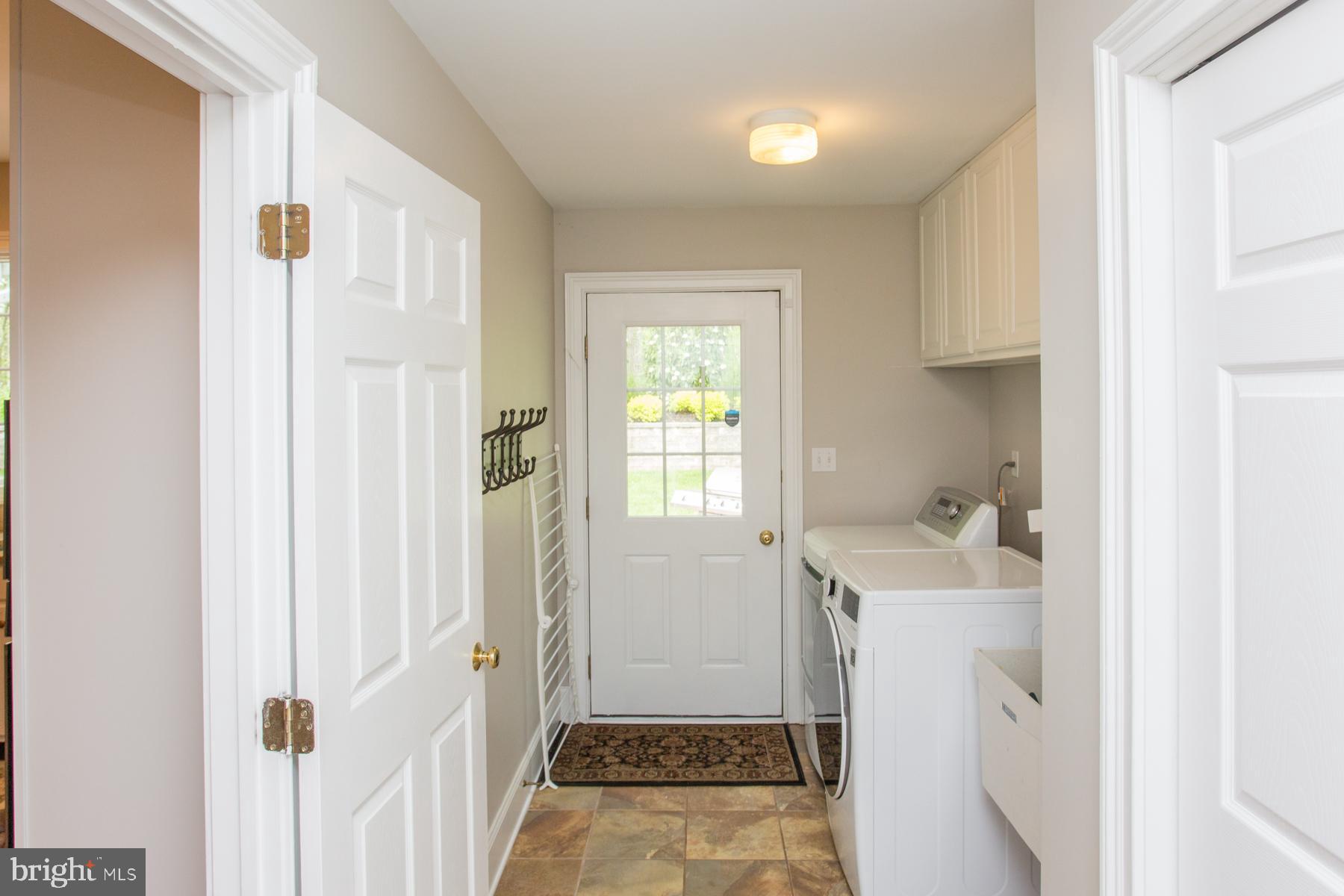 2131 Hawthorne Road New Hope, PA 18938 - Photo 21 of 48 Laundry Room with New Tile & Cabinetry