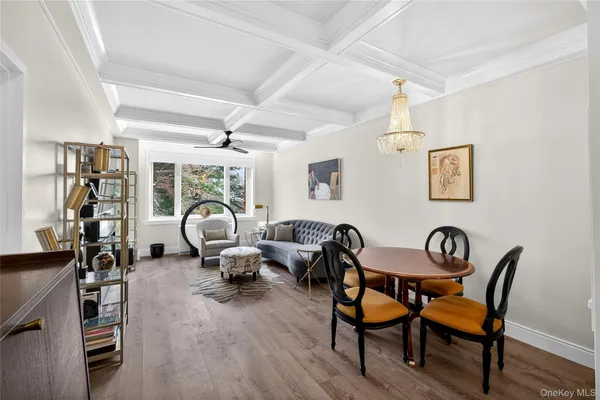 a living room with a fireplace and a flat screen tv