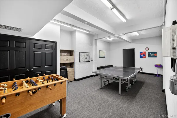 a view of a room with wooden walls