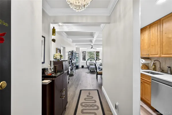 a view of a living room and hardwood floor