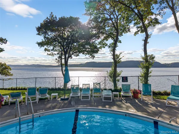 a view of a street with cars