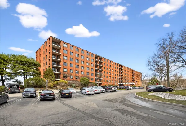 a view of a building with a street