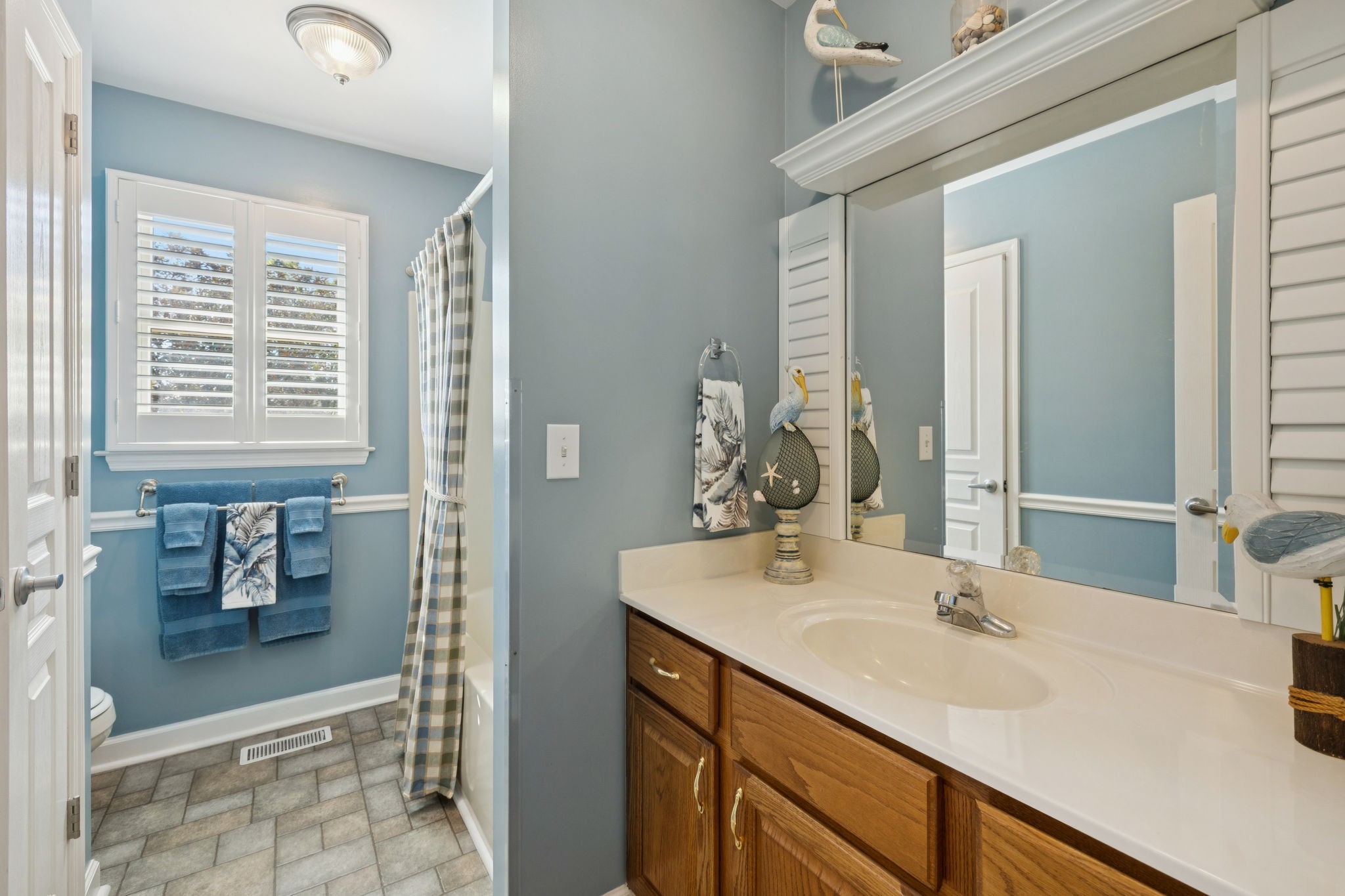 7875 Oscar Green Road Primm Springs, TN 38476 - Photo 12 of 44 a bathroom with a sink and a mirror