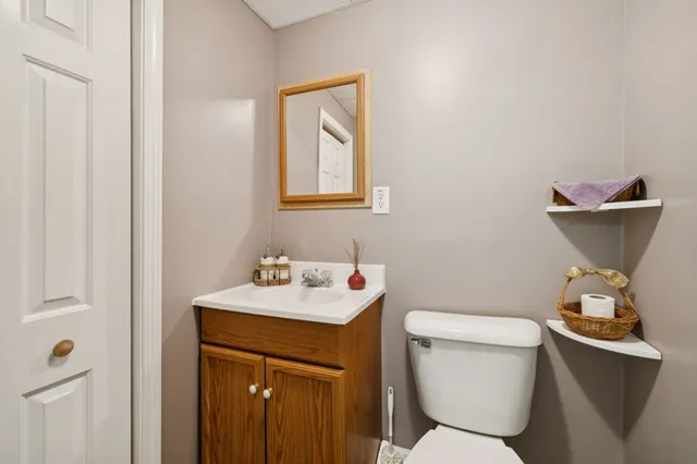 a utility room with cabinets washer and dryer