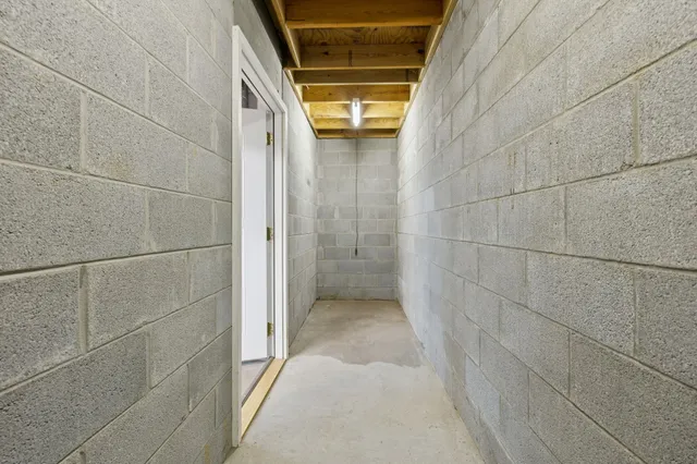 a view of a room with a glass door