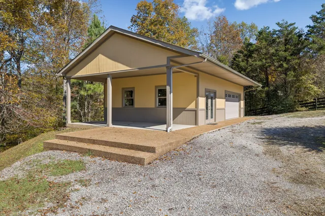 a view of a house with a patio