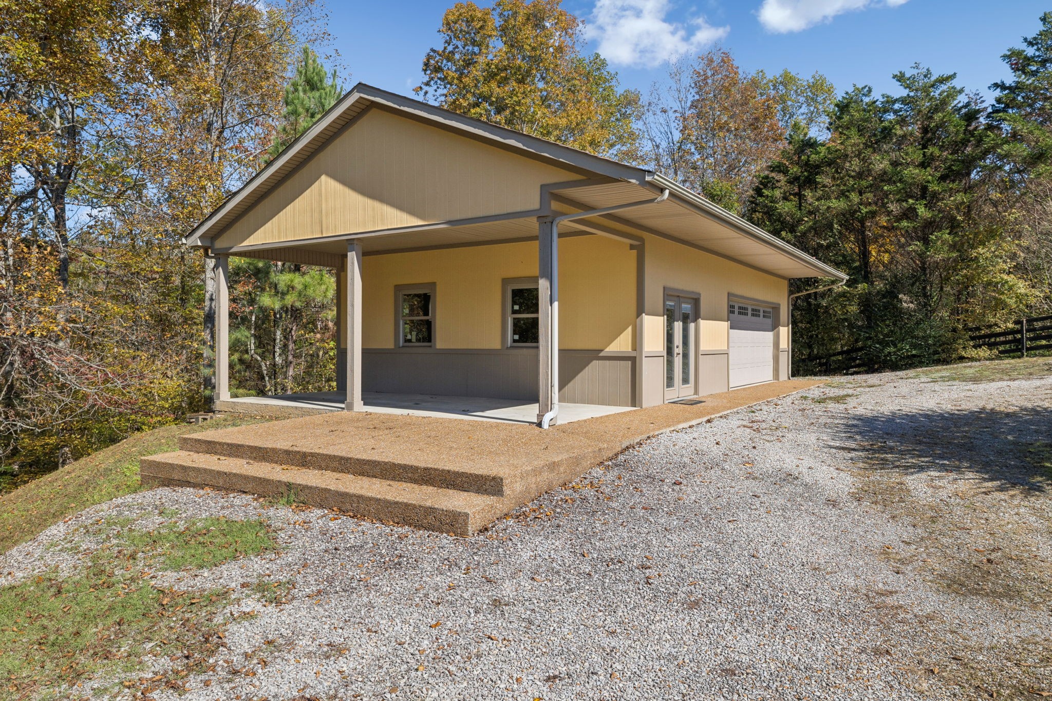 7875 Oscar Green Road Primm Springs, TN 38476 - Photo 29 of 44 a view of a house with a yard and large tree
