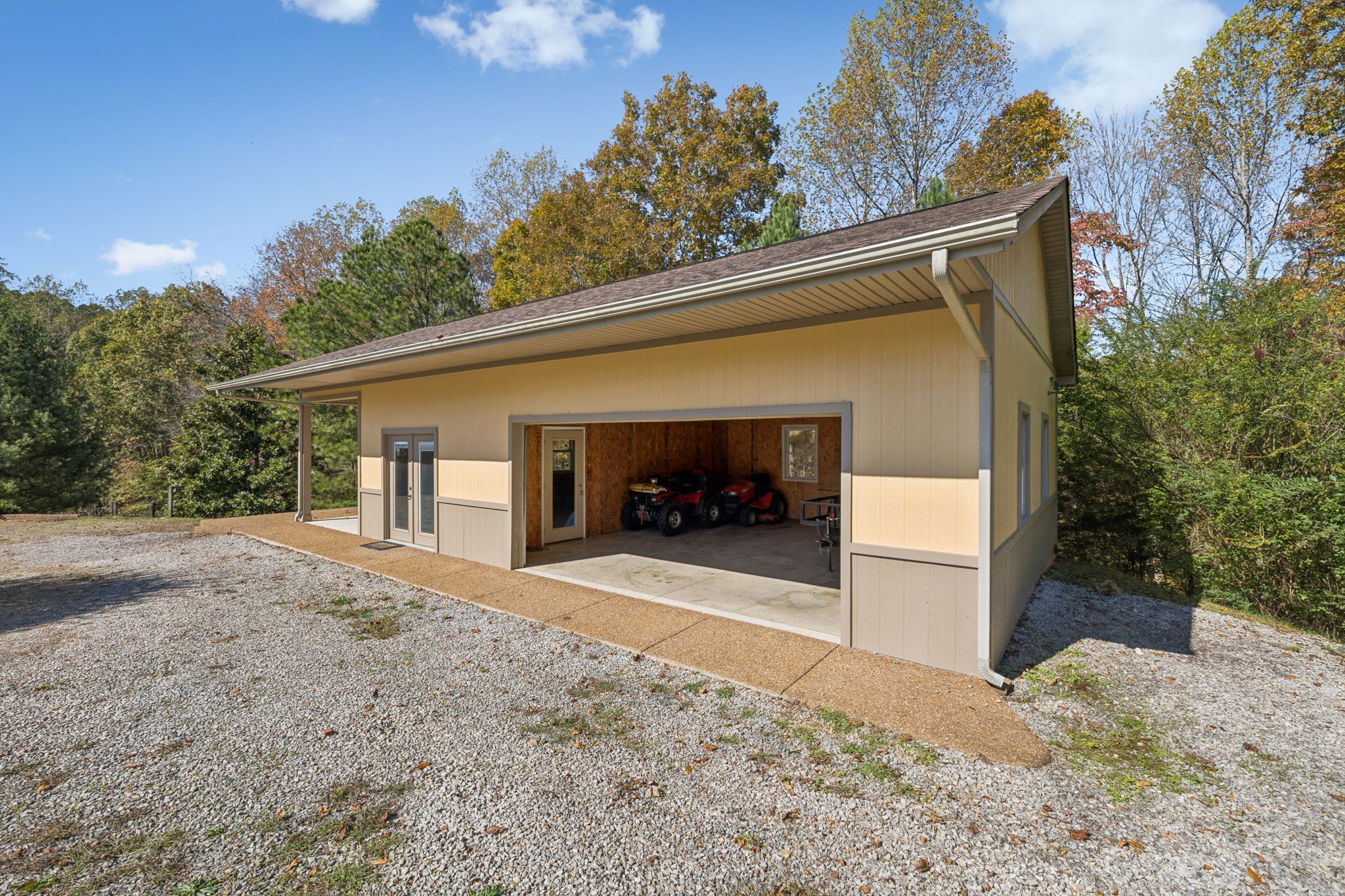 7875 Oscar Green Road Primm Springs, TN 38476 - Photo 30 of 44 a view of a house with a patio