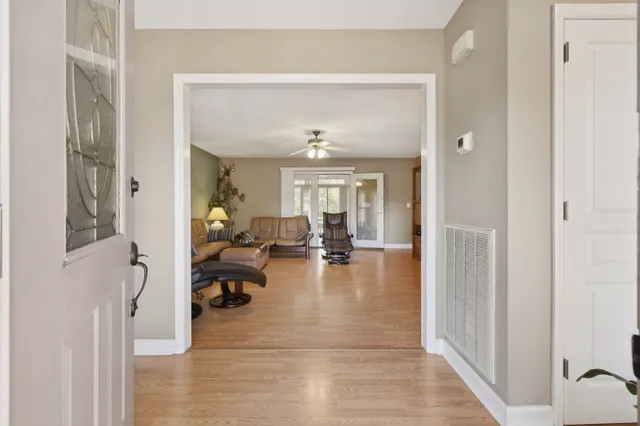 a view of a living room and dining room
