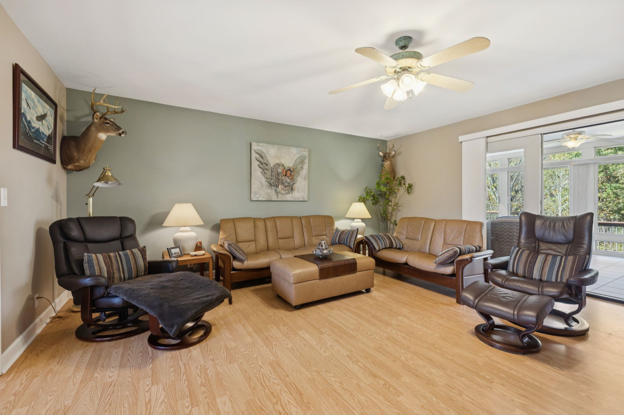 7875 Oscar Green Road Primm Springs, TN 38476 - Photo 5 of 44 a living room with furniture and a chandelier