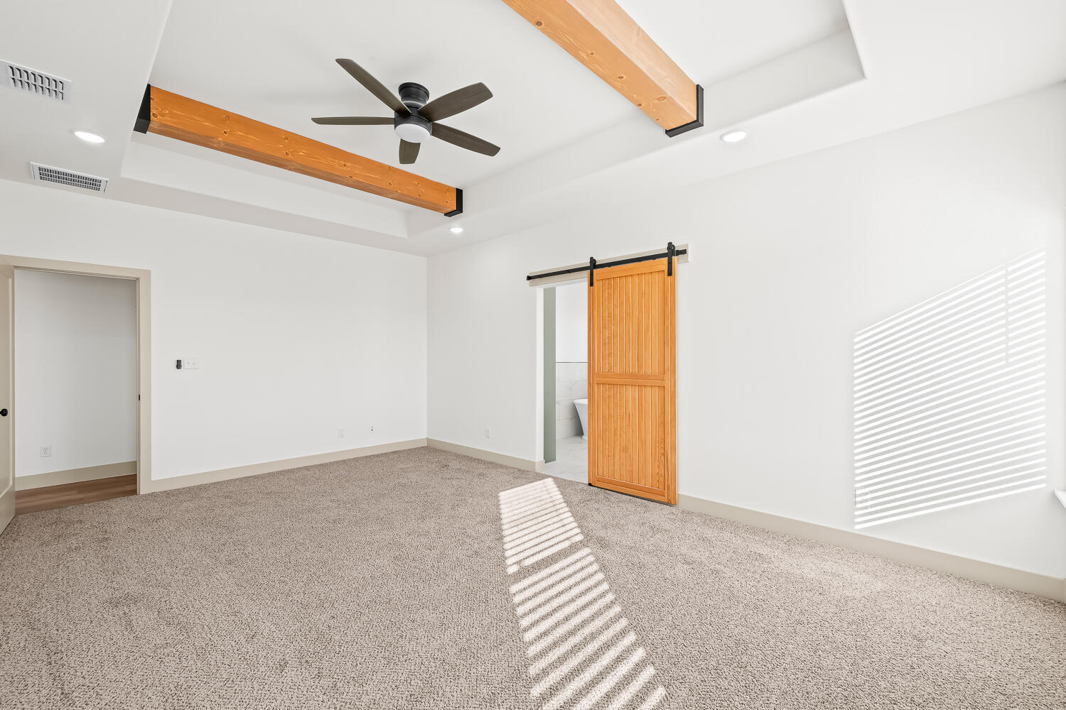 8412 North County Road 1300 Shallowater, TX 79363 - Photo 11 of 43 a view of a room with a ceiling fan