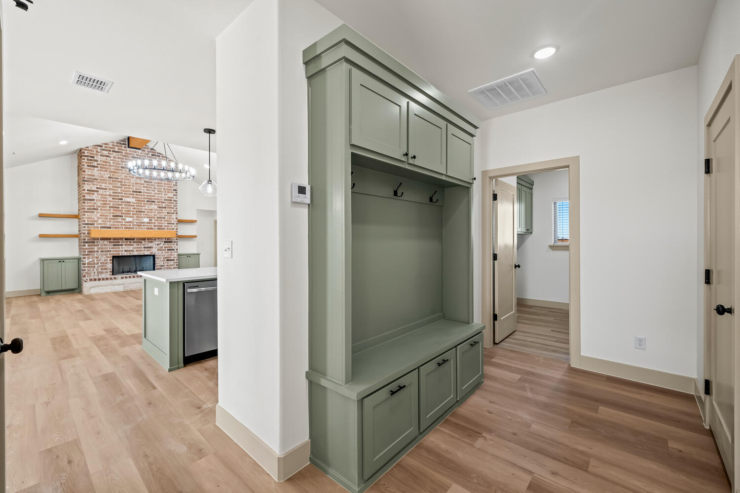 8412 North County Road 1300 Shallowater, TX 79363 - Photo 14 of 43 a kitchen with stainless steel appliances a refrigerator and a stove