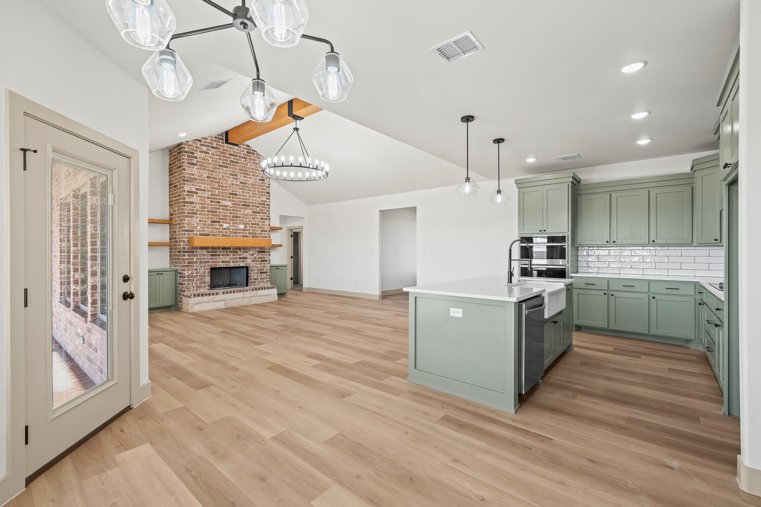 8412 North County Road 1300 Shallowater, TX 79363 - Photo 16 of 43 a kitchen with a refrigerator and a stove top oven