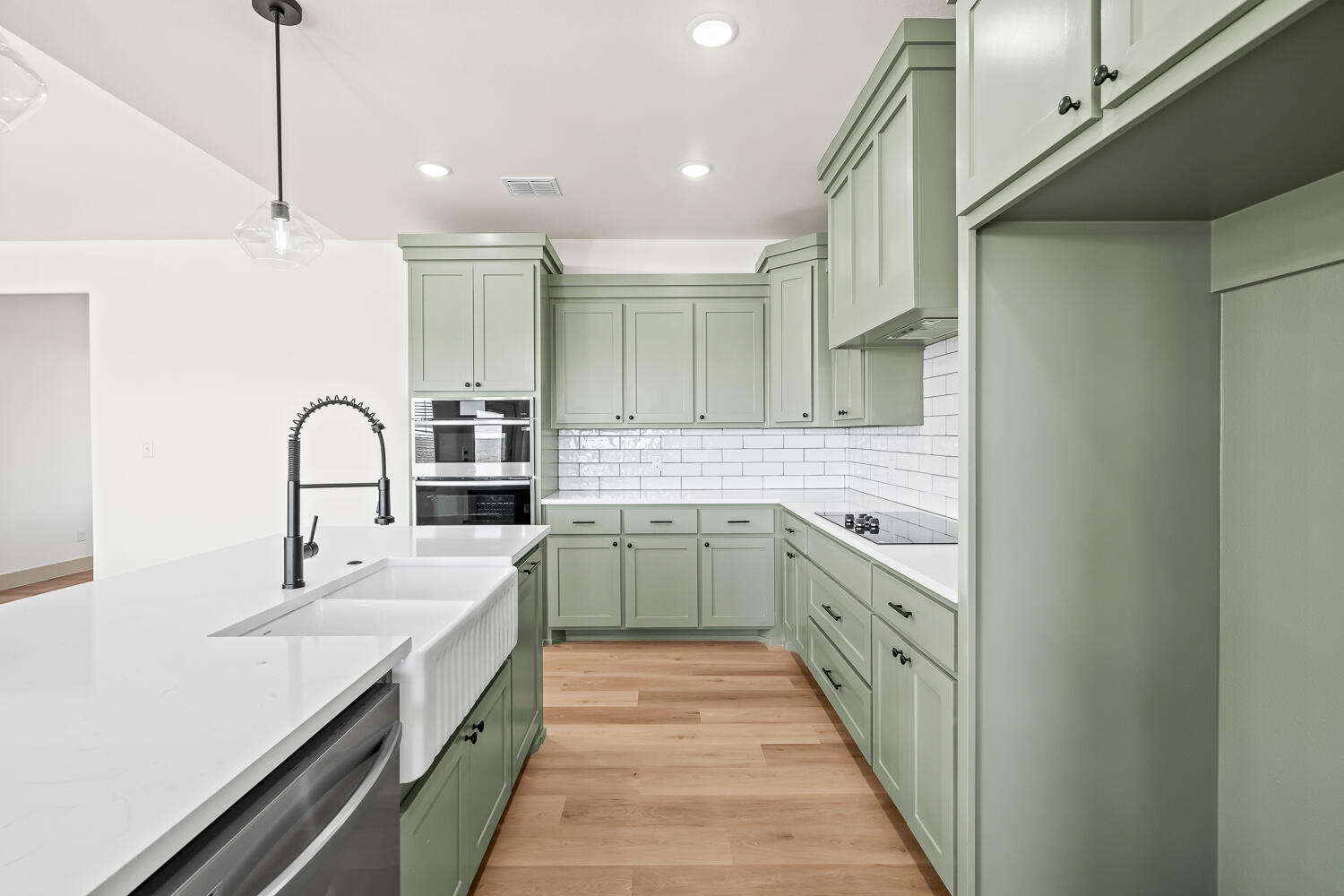 8412 North County Road 1300 Shallowater, TX 79363 - Photo 18 of 43 a kitchen with a sink stove and cabinets
