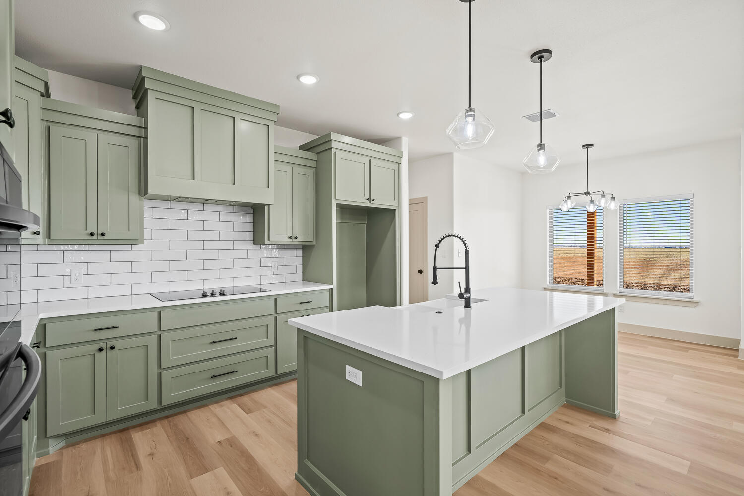 8412 North County Road 1300 Shallowater, TX 79363 - Photo 21 of 43 a kitchen with a sink refrigerator and cabinets