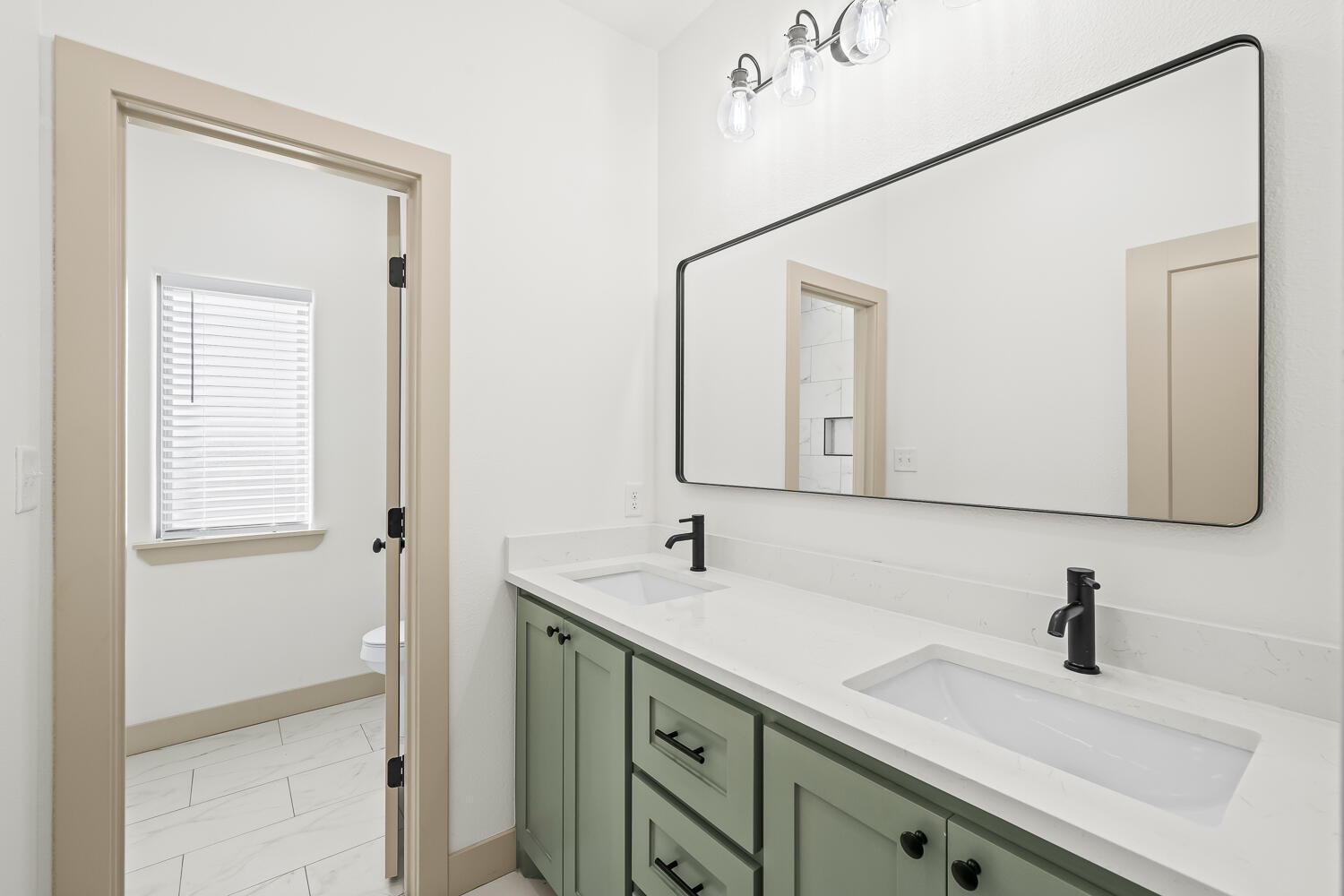 8412 North County Road 1300 Shallowater, TX 79363 - Photo 34 of 43 a bathroom with a sink and a mirror