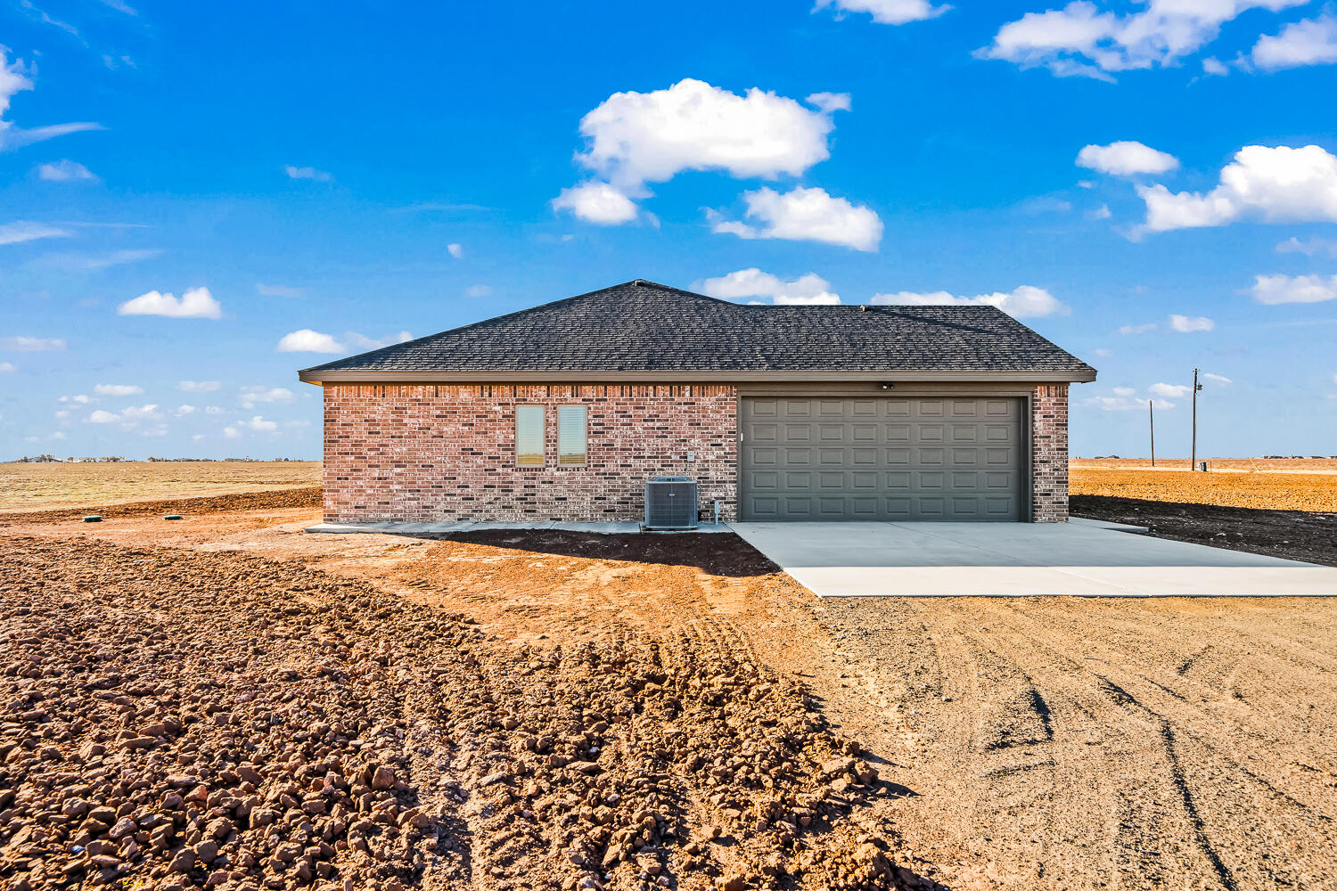 8412 North County Road 1300 Shallowater, TX 79363 - Photo 39 of 43 a view of a house with a yard