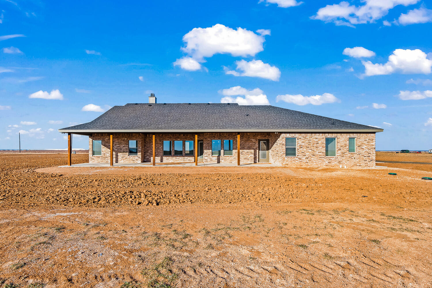 8412 North County Road 1300 Shallowater, TX 79363 - Photo 42 of 43 a view of house with a swimming pool